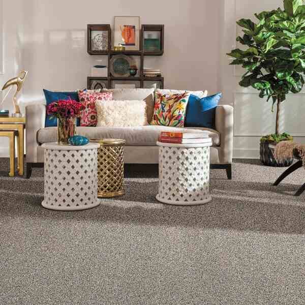 Elegant living room with a large carpet featuring a gray and plain design, ideal for luxury villa and apartment interior design in Dubai