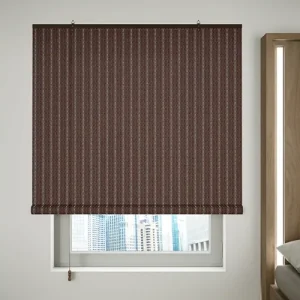 Elegant reddish-brown woven bamboo window shade for UV blocking, privacy, sophisticated home decor in Dubai luxury living spaces