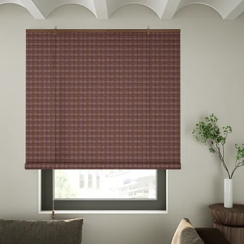 Elegant reddish-brown woven bamboo window shade for UV blocking, privacy, and sophisticated home decor in Dubai luxury living spaces